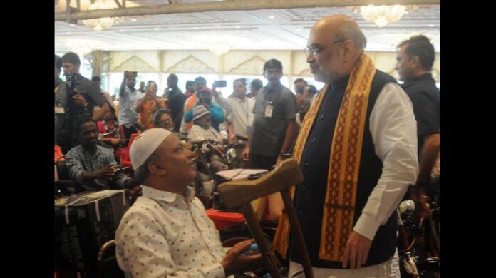 In an event held to mark Modi’s 72nd birthday, under the aegis of Atal Behari Vajpayee Foundation, Amit Shah distributed appliances and kits to differently-abled persons here on Saturday. — DC Image/Deepak Deshpande