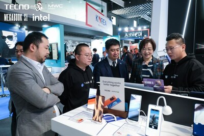 The Senior VP and Chair of INTEL China Visits TECNO Mar 1st, 2023. The Vice President of Transsion Holdings Ha Le (The man on left) meets Senior VP and Chair of INTEL China Wang Rui( The lady at second right) at TECNO booth, MWC 2023 Barcelona.