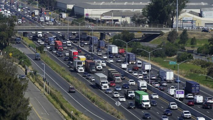 Traffic moves on Interstate-880 in Oakland, Calif., Tuesday, Aug. 16, 2022. (AP Photo/Jeff Chiu)