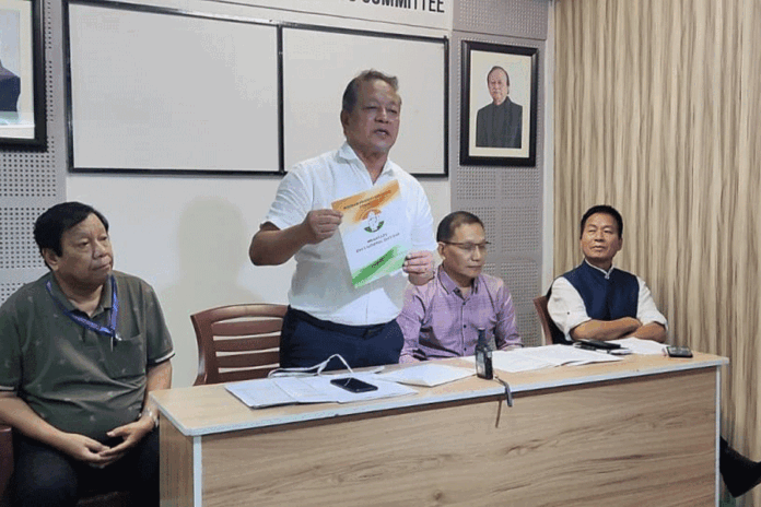 Lal Thanzara, senior vice-president — the Mizoram PCC — releases the party manifesto at the Congress Bhavan in Aizawl on Tuesday.
