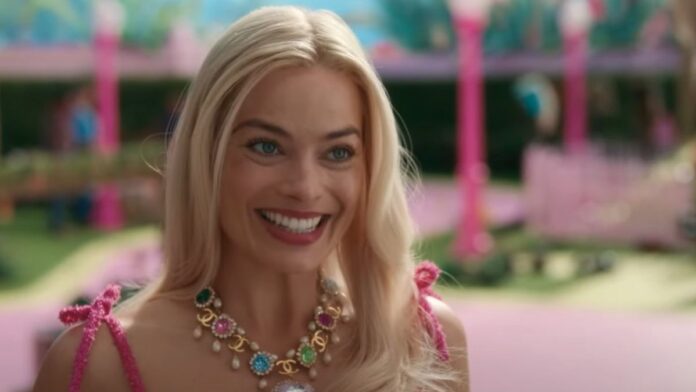 Margot-Robbie-Is-Rumored-To-Have-Taken-Out-Insurance-On.jpg Margot Robbie smiling in Barbie.