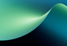 Modernes Entgeltsystem: Verhandlungen starten am 12. November Abstract wave shape in green and blue tones.